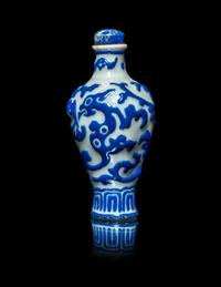 A Chinese Blue and White Enameled Molded Porcelain Snuff Bottle