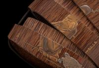 A Japanese Gold and Brown Lacquered Wood Two-Case Inro