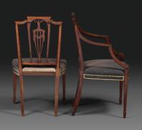 A Set of Eight Federal Carved Mahogany Dining Chairs