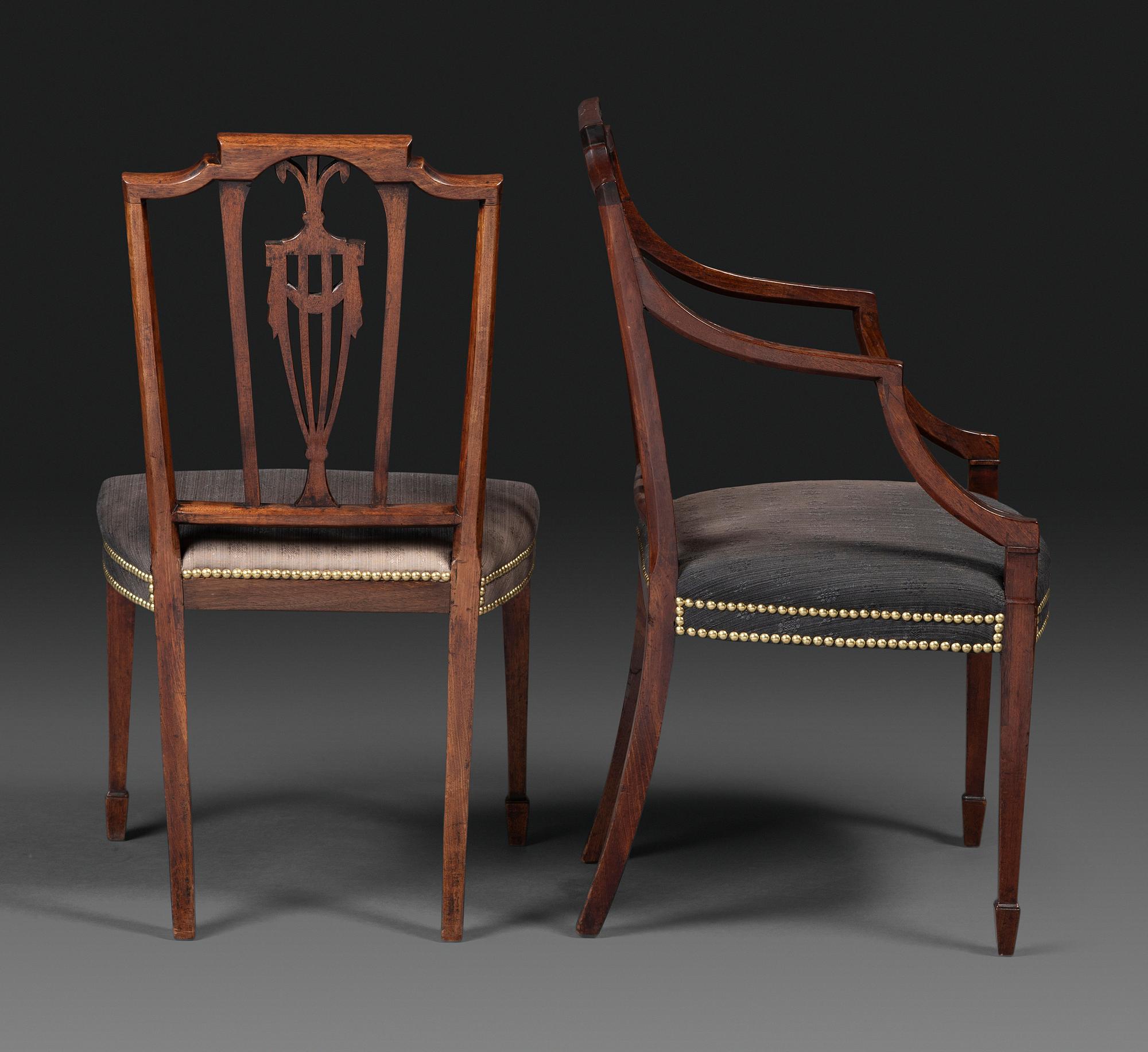 A Set of Eight Federal Carved Mahogany Dining Chairs