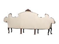 An Italian Carved and Black Painted Walnut High-Back Sofa