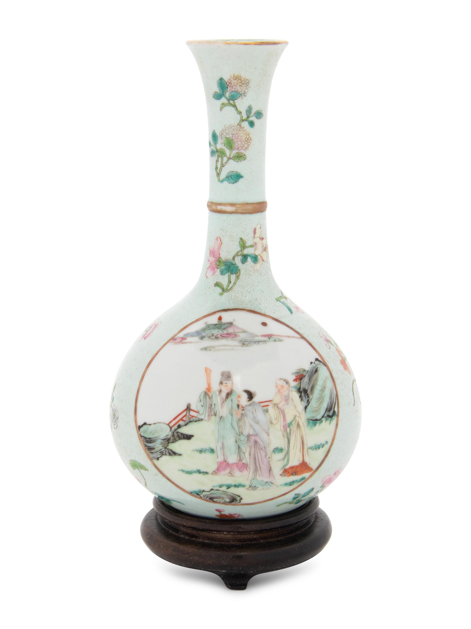 A Sgraffito Ground Famille Rose Porcelain Bottle Vase