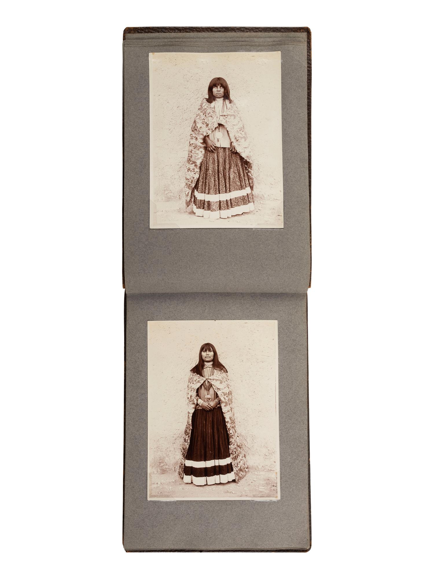 [NATIVE AMERICANS]. JONES, John Edward (1863-1922), photographer. Album containing 50 photographs of the San Carlos Indian Agency, including Apache civilians and police, agency buildings and dwellings, and scenic views. Ca 1904.