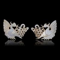A Pair of Chinese Pale Celadon Jade 'Peacock' Hat Ornaments, Jin Dynasty 金 白玉孔雀珮一對