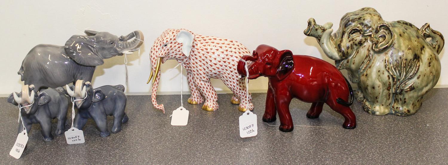A Collection of Six Porcelain Elephant Figures Height of largest 7 inches.