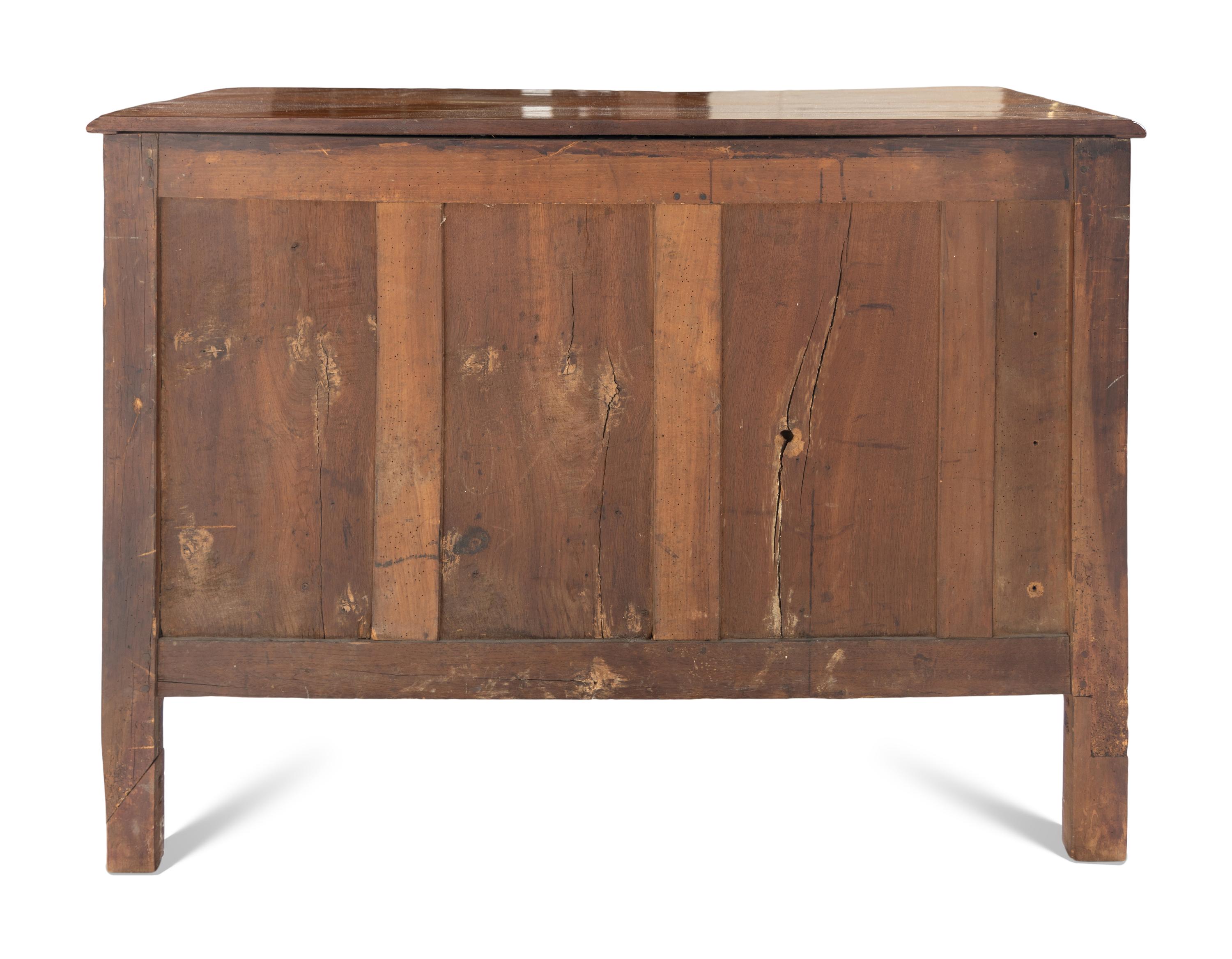 A Louis XV Provincial Walnut Commode