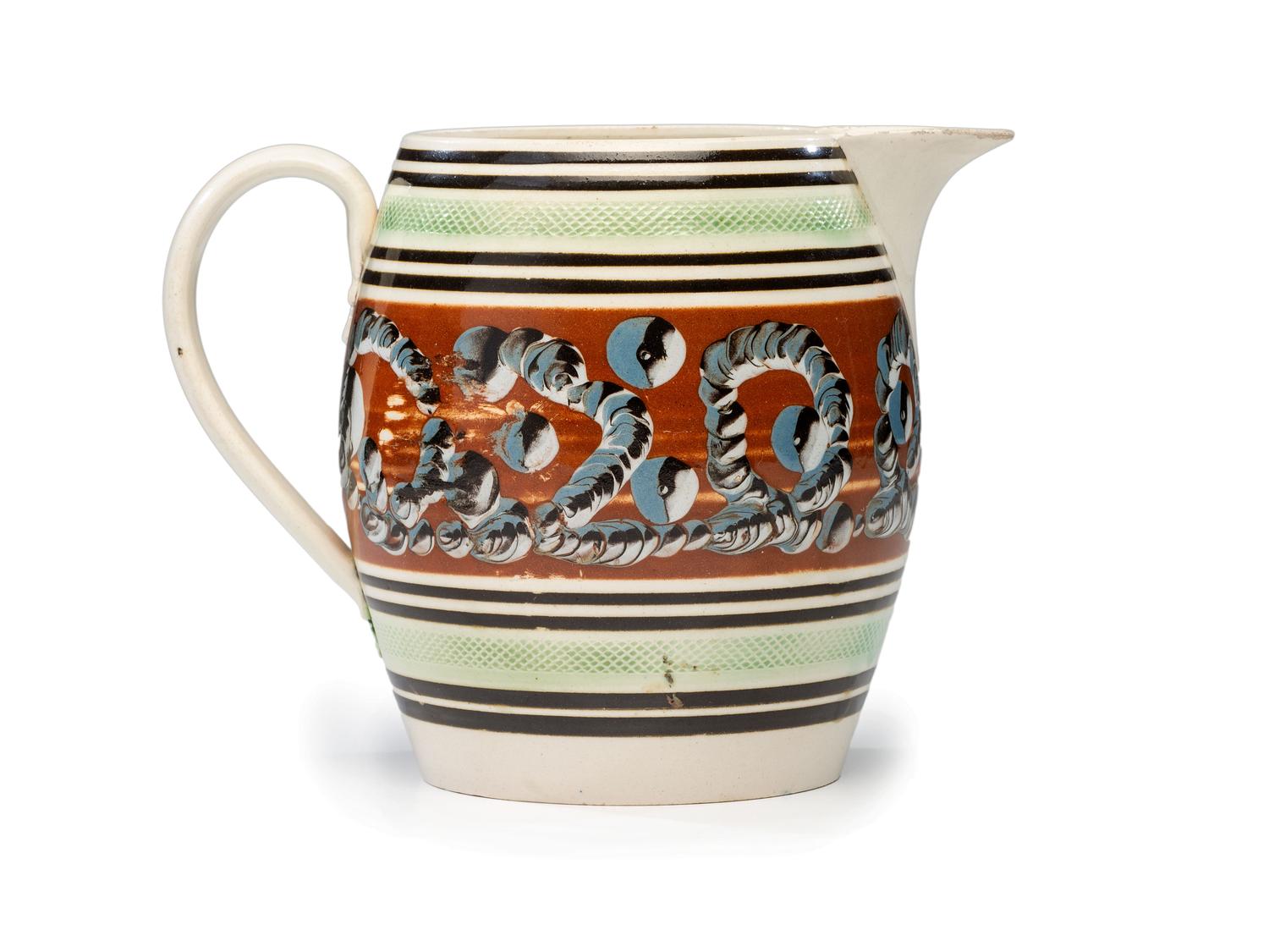 A 'Worm and Cat's Eye' Mochaware Pitcher