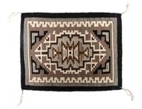 A Miniature Two Grey Hills Tapestry 17 1/2 x 13 inches.
