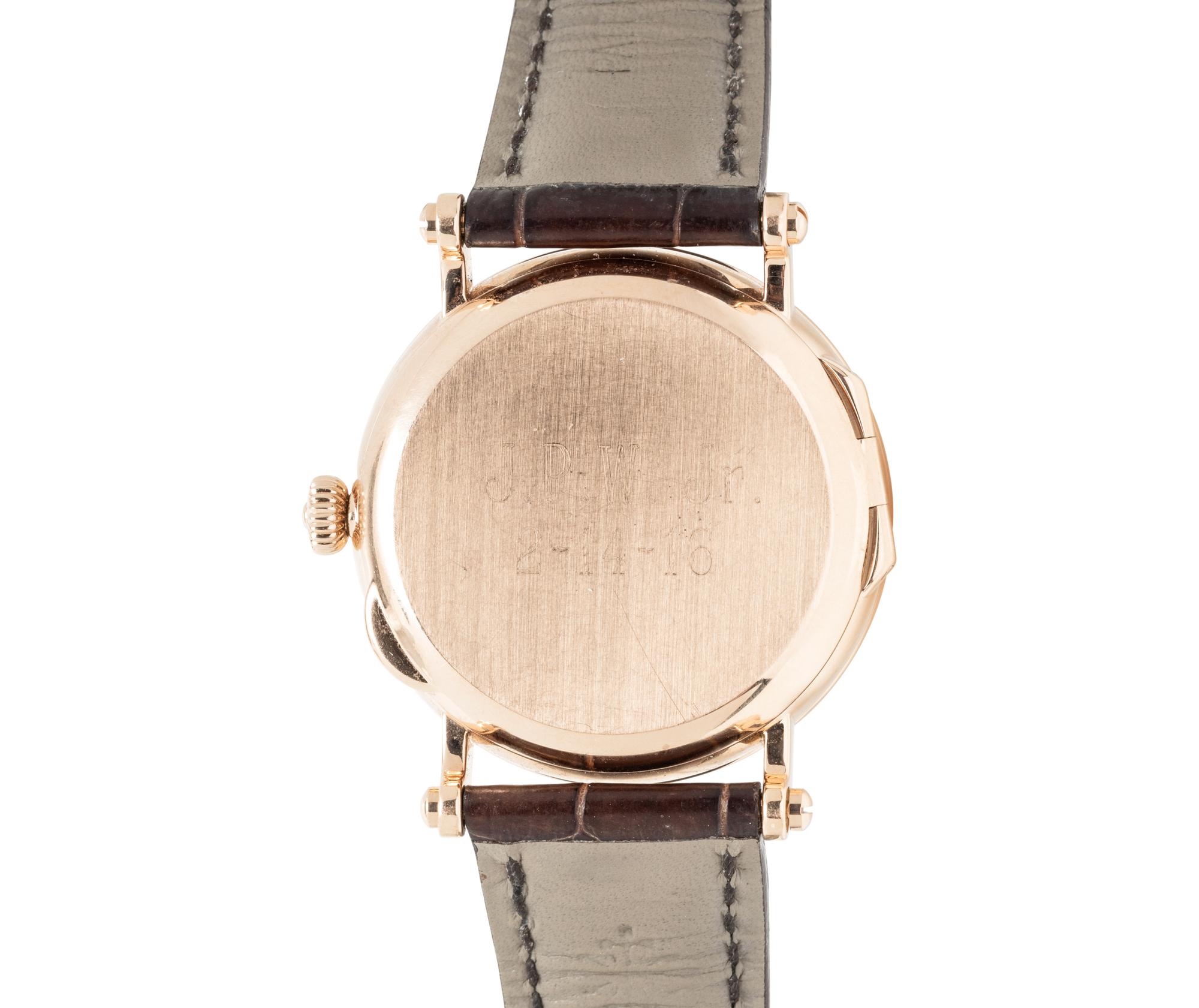 PATEK PHILIPPE, REF. 5053 18K YELLOW GOLD 'CALATRAVA' DATE WATCH WITH OFFICER'S CASEBACK