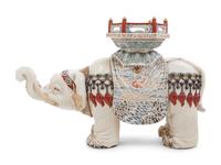 A Chinese Export Porcelain Model of a Caparisoned Elephant with Guanyin