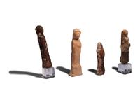 Four Near Eastern Stone and Terracotta Figures of Tanit