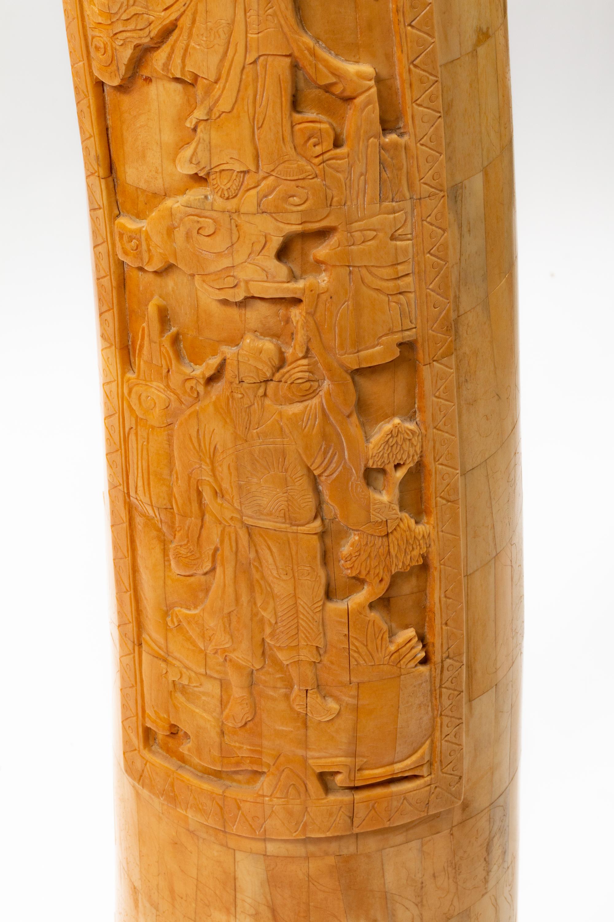 A Pair of Chinese Export Carved Bone Tusks with Wood Bases