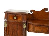 A Regency Gilt Bronze Mounted Mahogany Two-Pedestal Sideboard