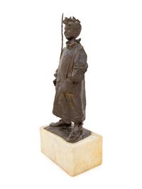 A Bronze Figure of a Boy