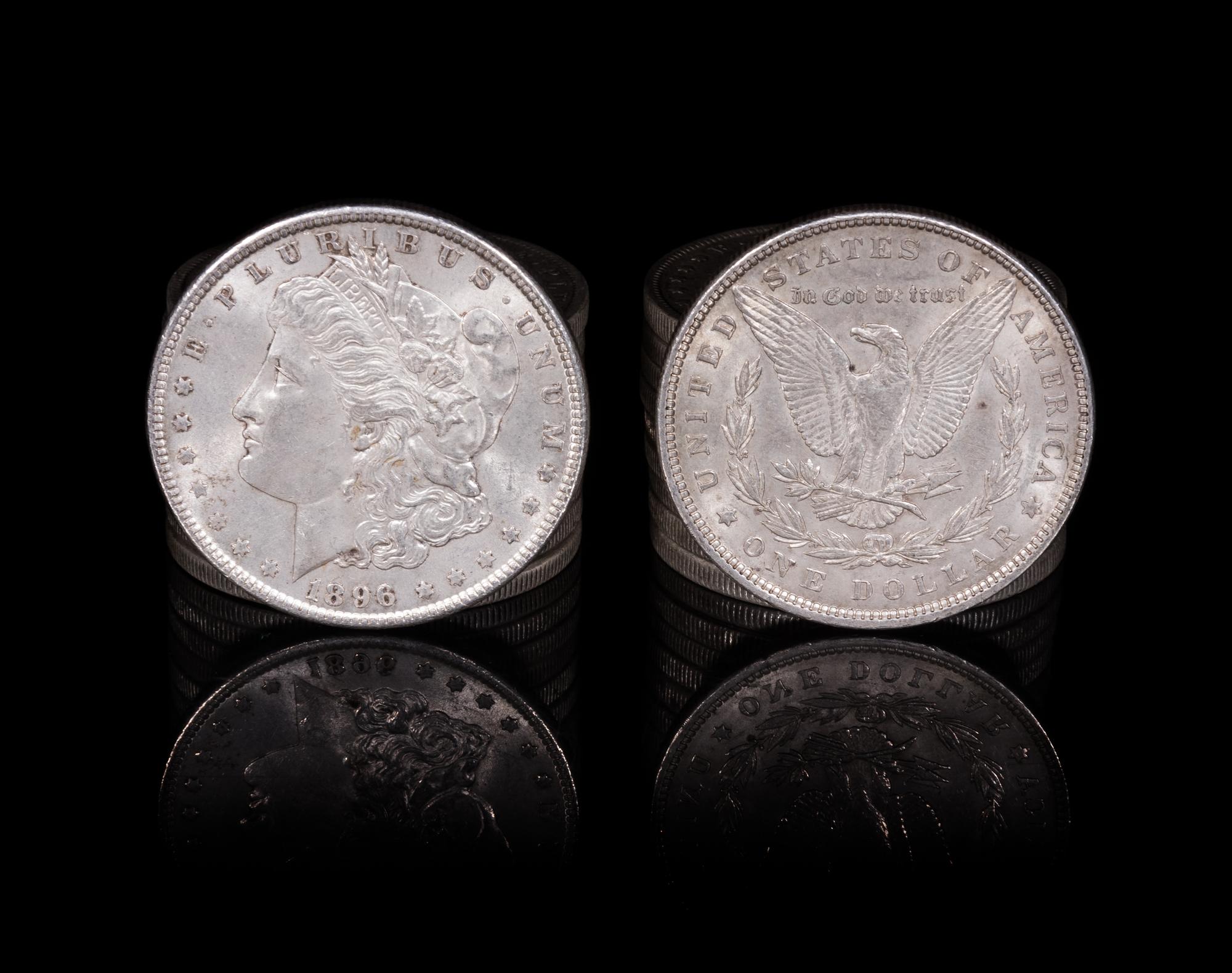 A Group of Twenty United States Morgan Silver Dollar Coins