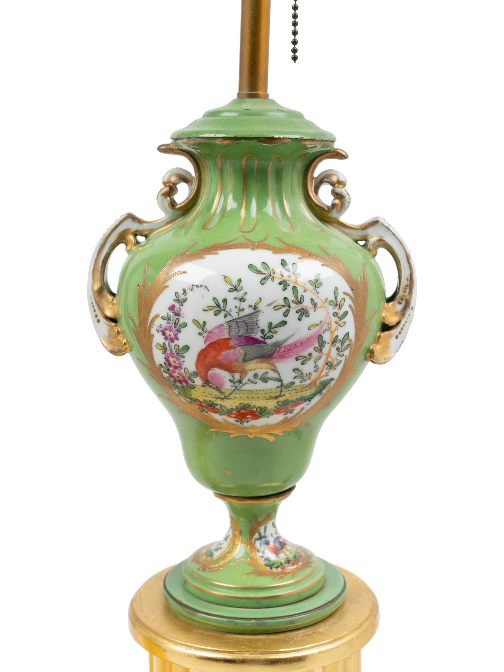 A Pair of Sèvres Style Porcelain and Giltwood Urns Mounted as Lamps