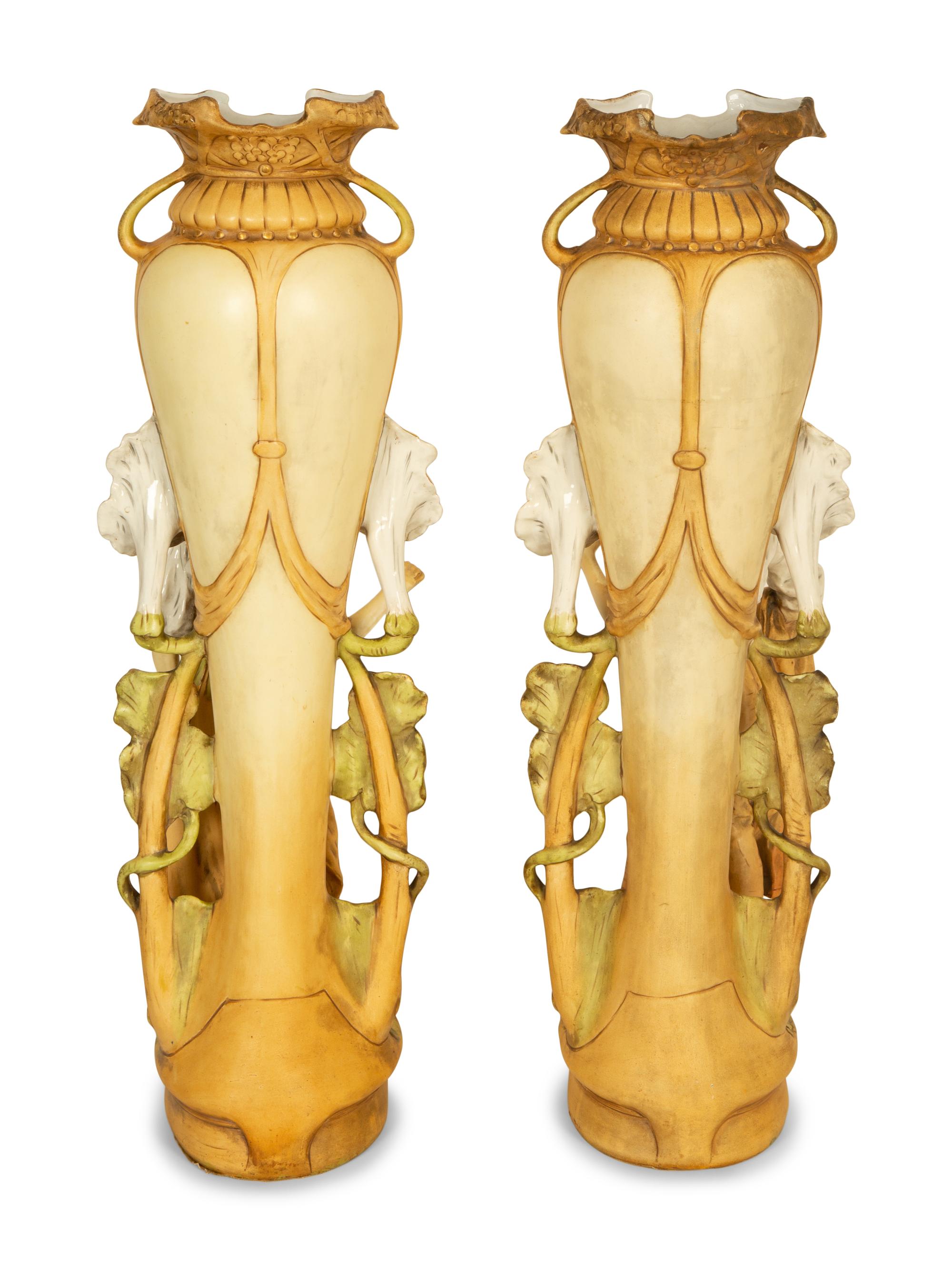A Pair of Royal Dux Porcelain Figural Vases