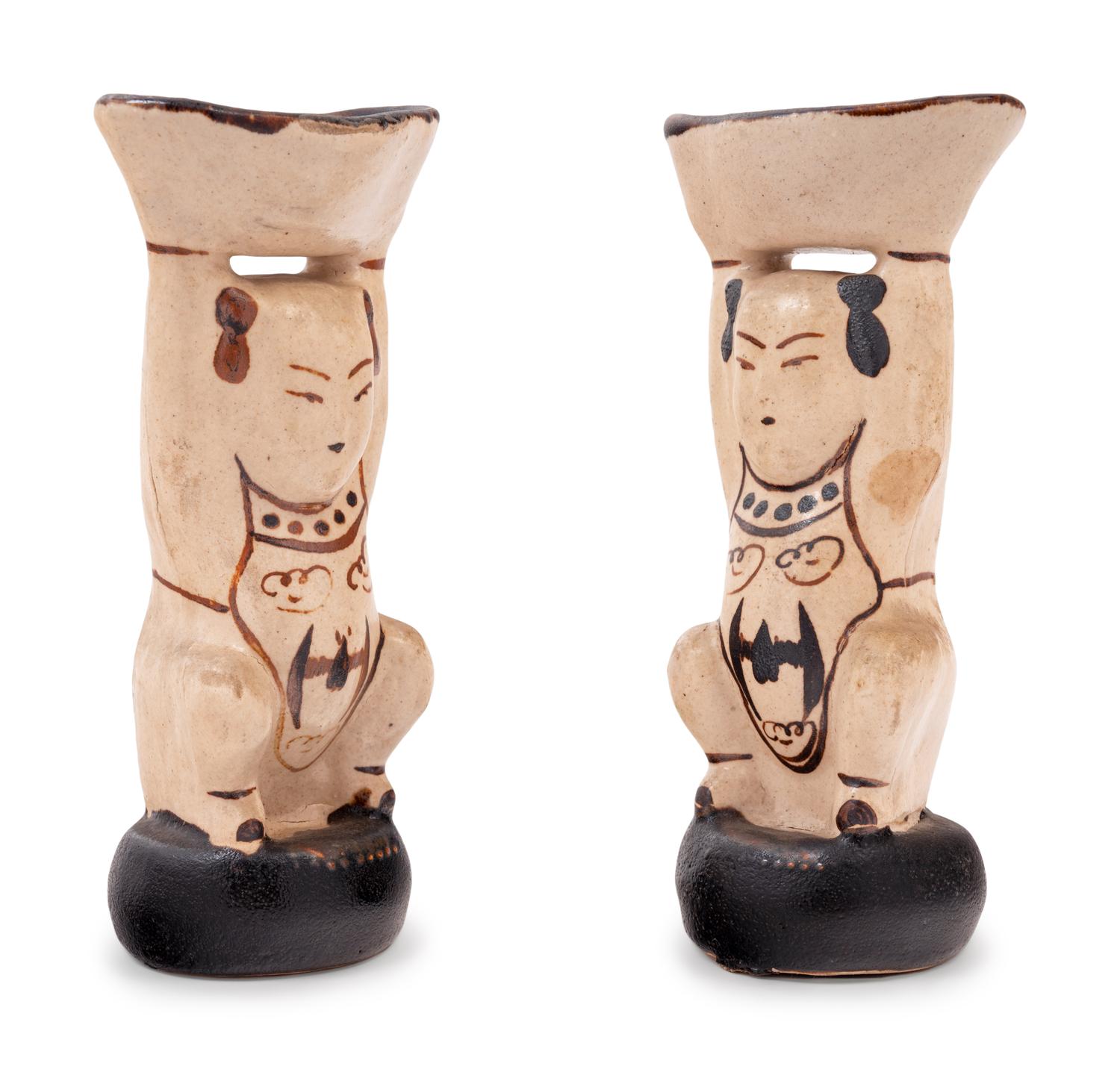 A Pair of Chinese Cizhou Style Porcelain Figural-Form Candlesticks