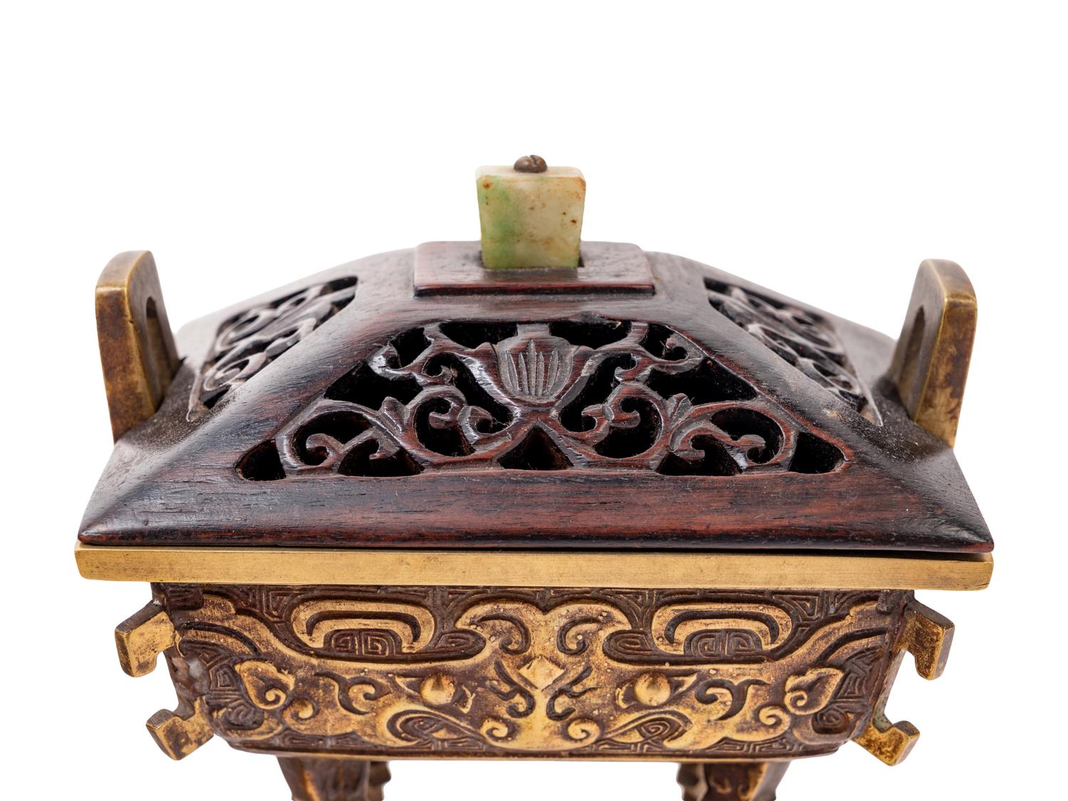 A Chinese Parcel-Gilt Bronze Ding- Form Incense Burner