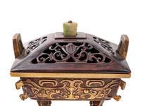 A Chinese Parcel-Gilt Bronze Ding- Form Incense Burner