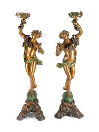 A Pair of Continental Gilt and Polychromed Figural Torchères