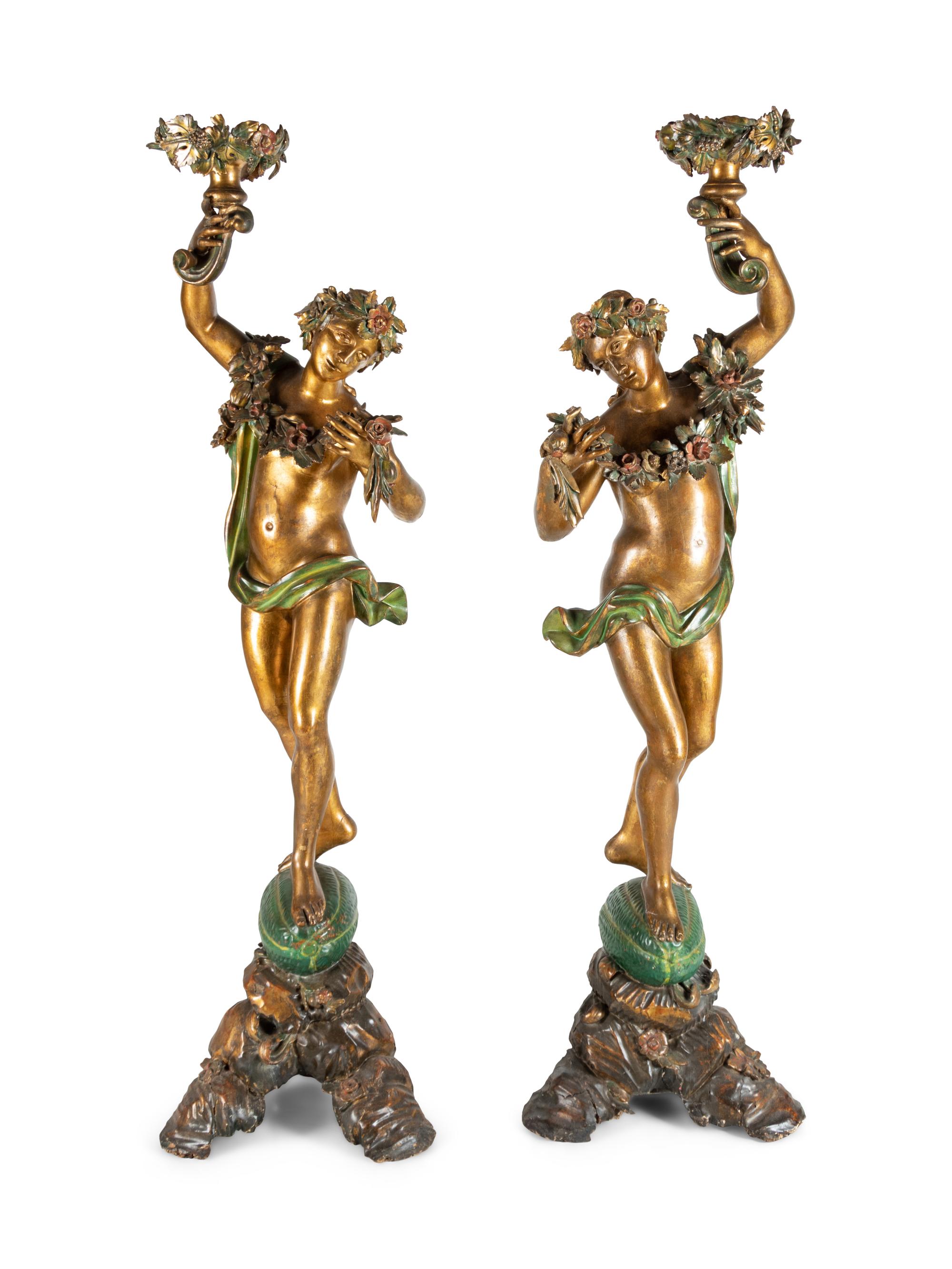 A Pair of Continental Gilt and Polychromed Figural Torchères