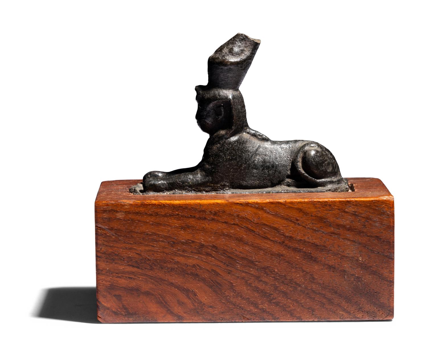 An Egyptian Bronze Sphinx