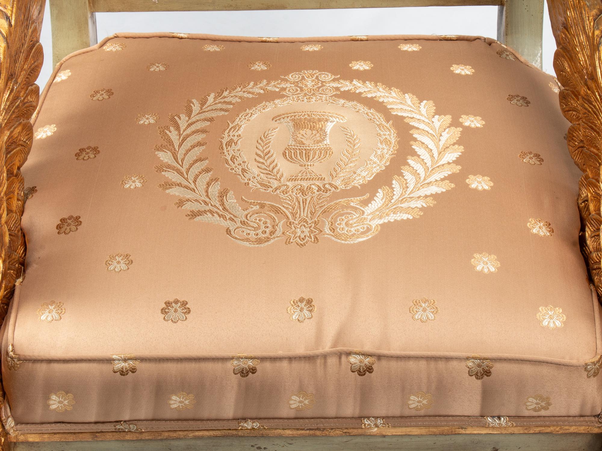 A Pair of Italian Neoclassical Style Painted and Parcel Gilt Eagle-Motif Armchairs