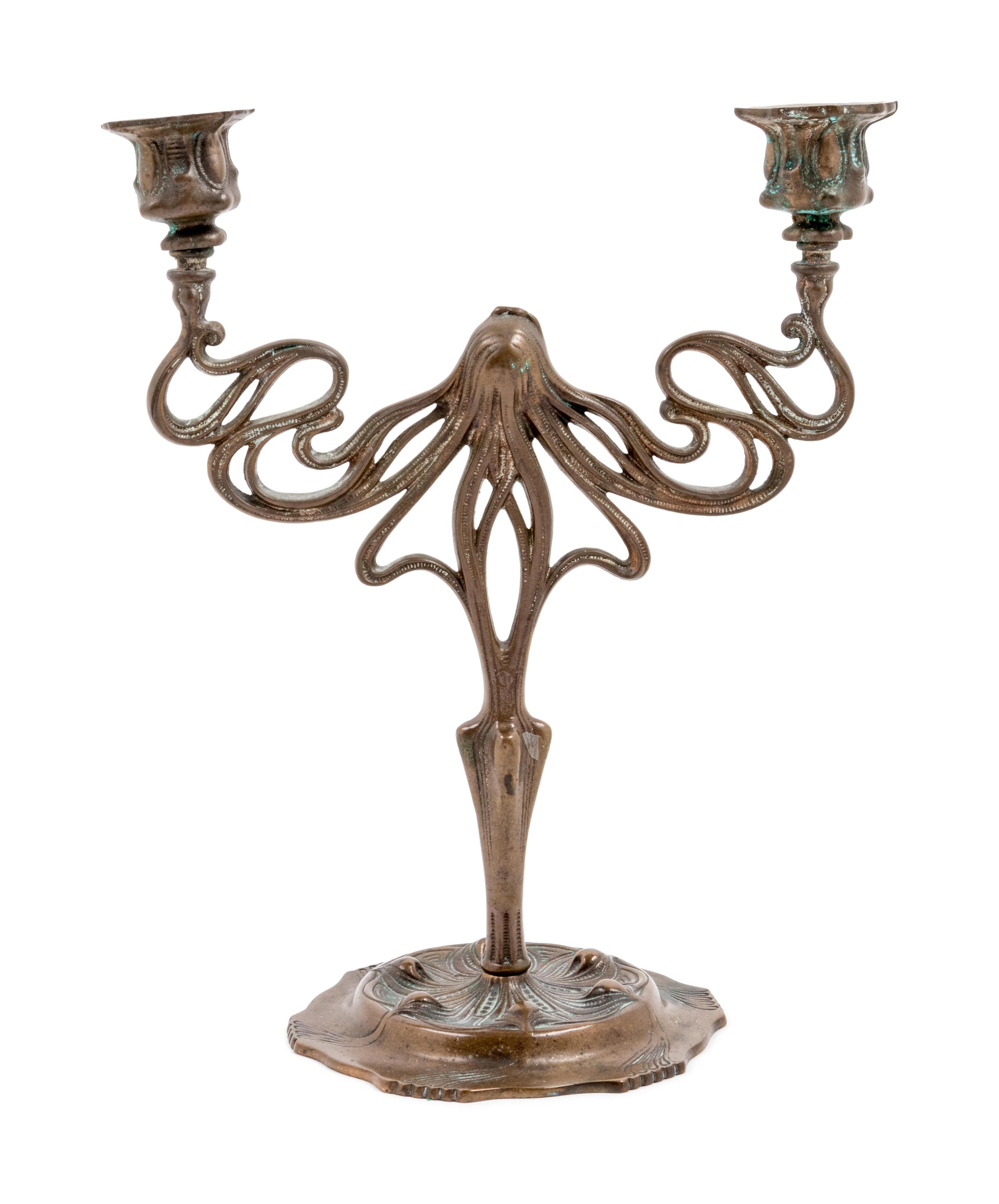 An Art Nouveau Patinated Bronze Two-Light Candelabra