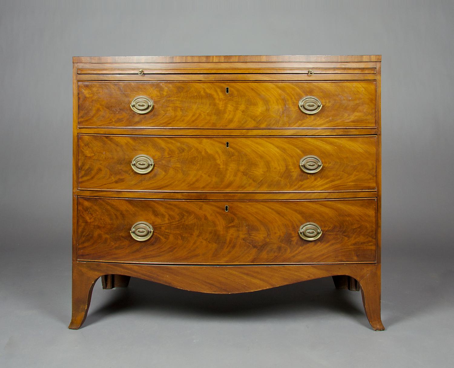 A George III Mahogany Bow Front Chest of Drawers, Height 34 3/4 x width 40 1/2 x depth 20 inches.