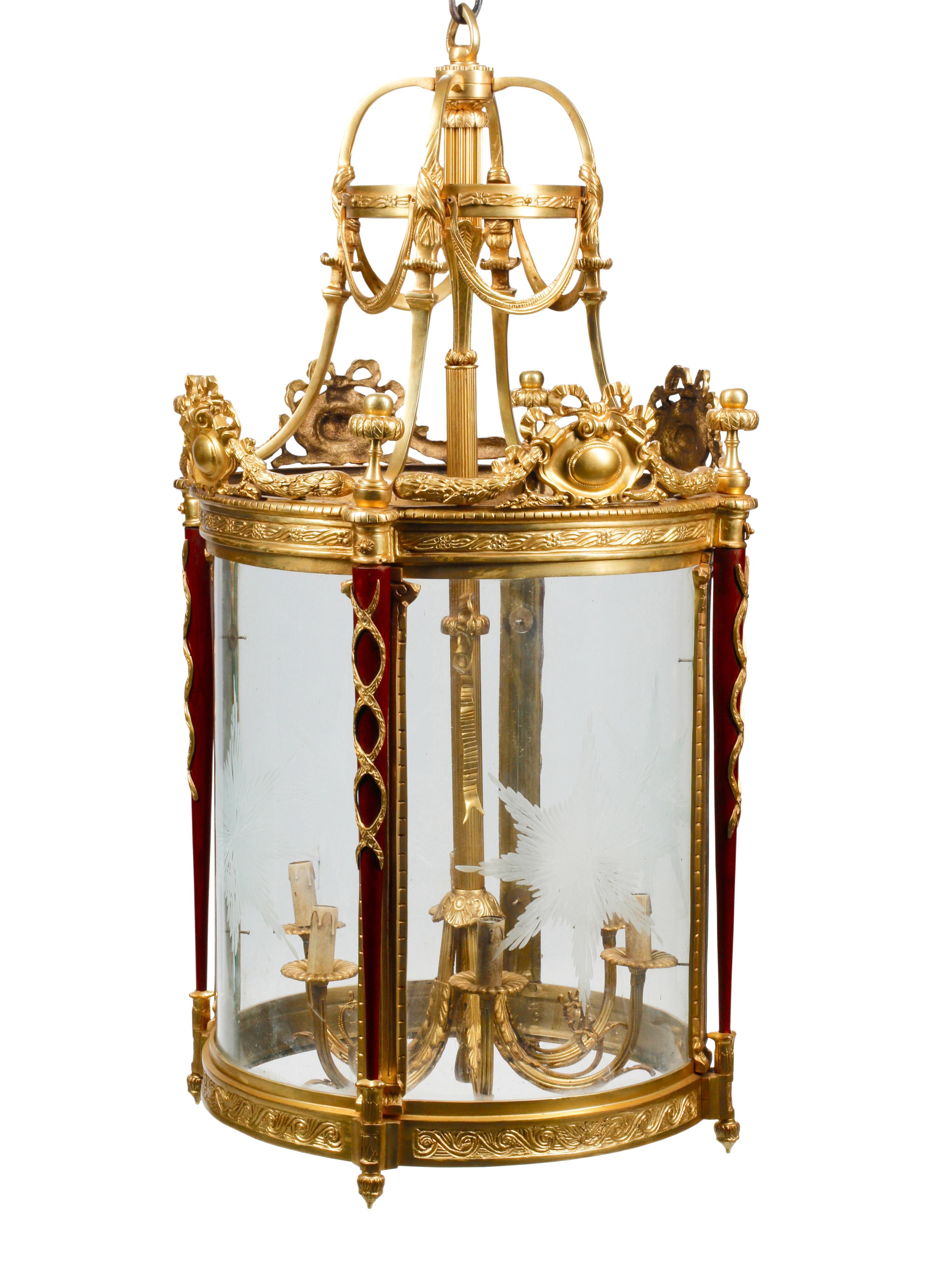 A Pair of Louis XVI Style Gilt Bronze and Mahogany Hall Lanterns
