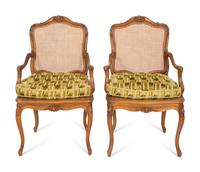 A Pair of Louis XV Style Caned Beechwood Fauteuils