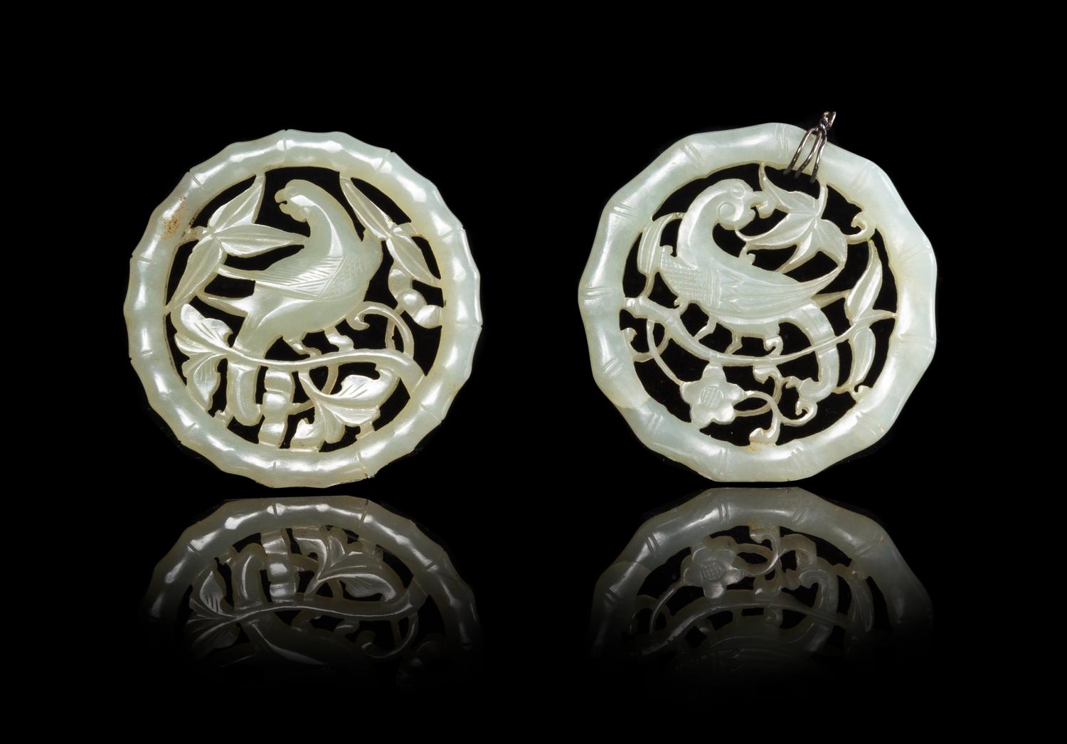 Two Celadon Jade Pendants Diameter of larger 2 1/8 inches. — 19TH CENTURY