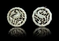Two Celadon Jade Pendants Diameter of larger 2 1/8 inches. — 19TH CENTURY