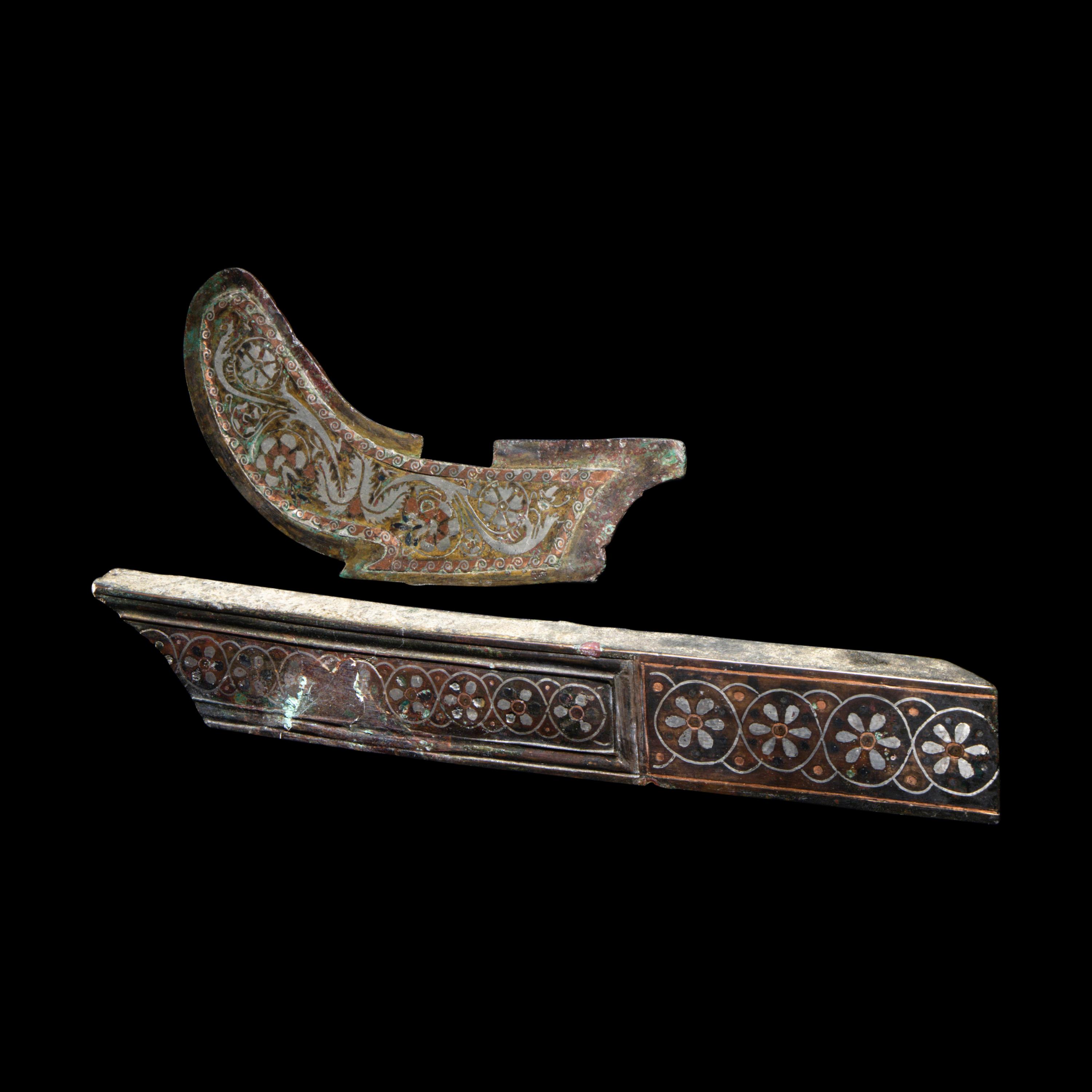 Two Roman Bronze and Enamel Furniture Inlays