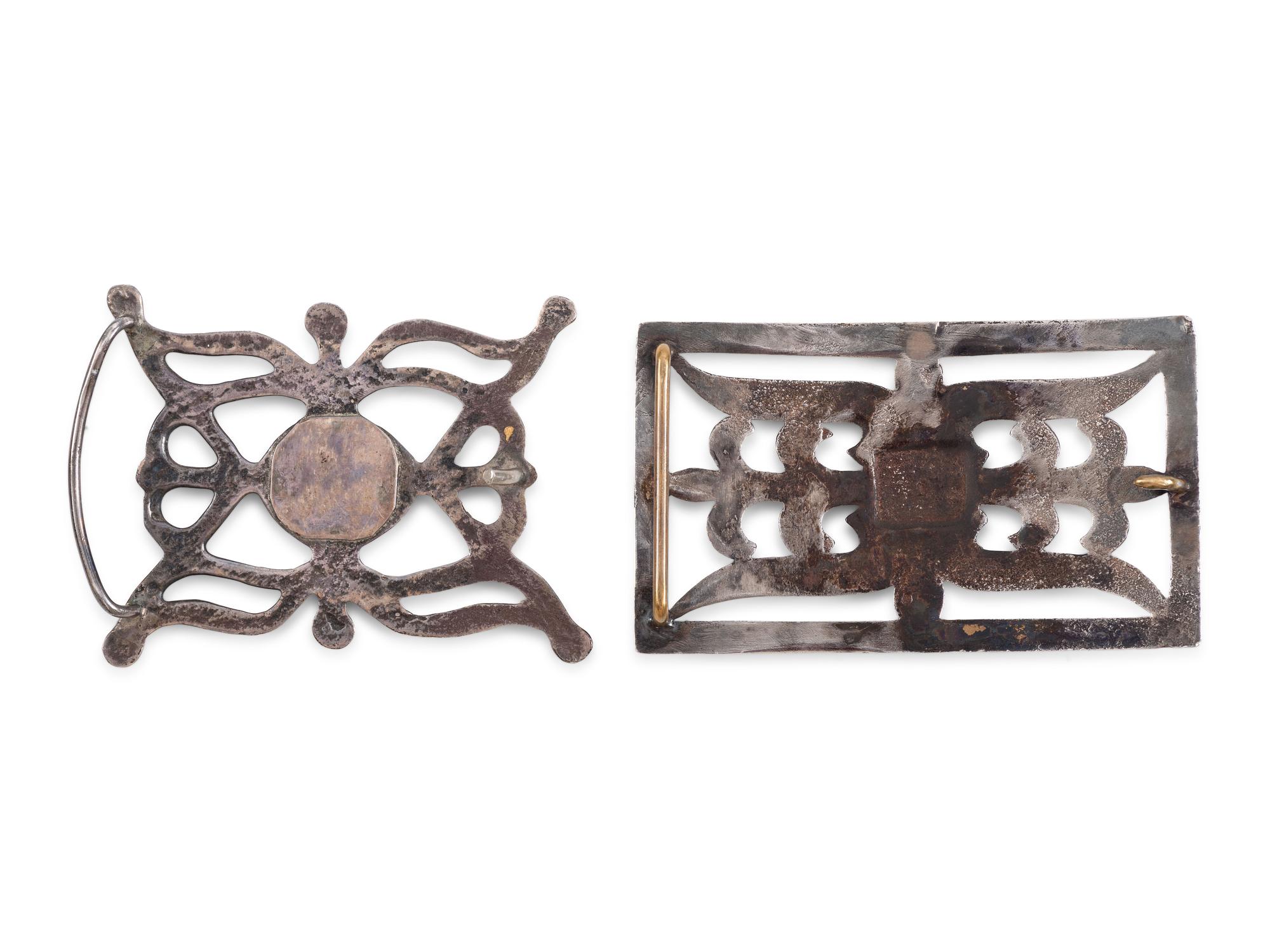 Pair of Navajo Sandcast Silver Belt Buckles