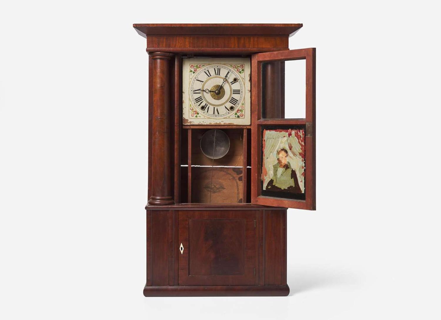 A Classical mahogany and mahogany veneer mantel clock with Andrew Jackson eglomise panel, bears printed paper label of Rodney Brace, North Bridgewater, MA, dated "1834"