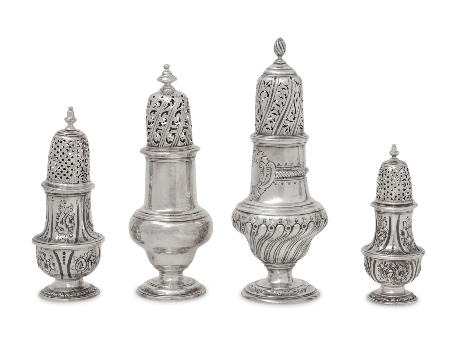 A Group of Four English Silver Casters and Muffineers