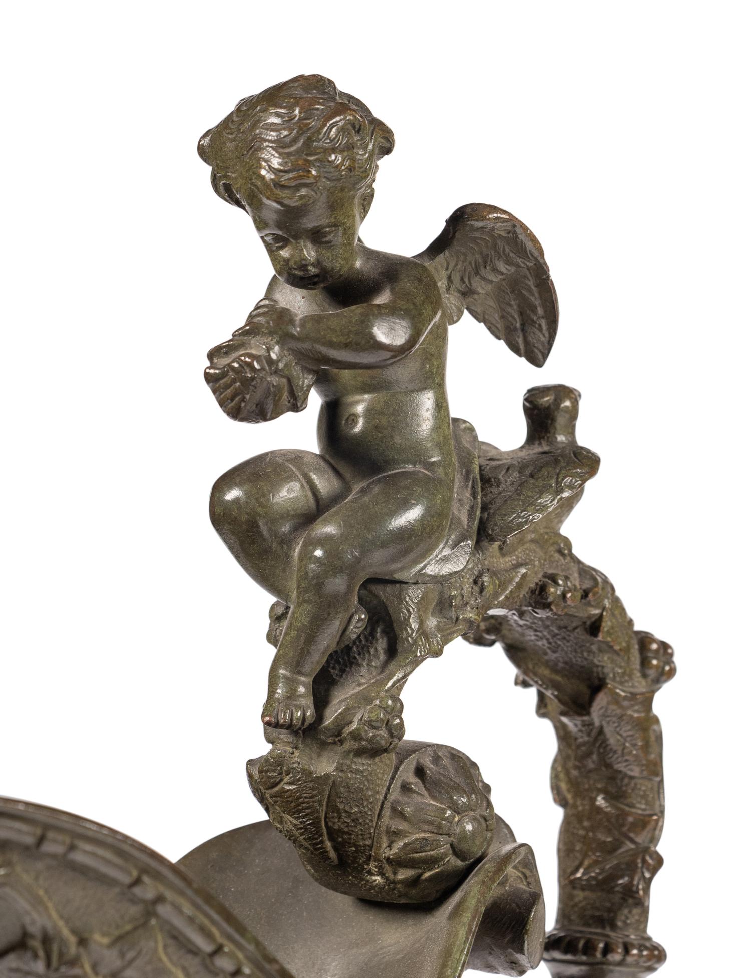 A Pair of Neoclassical Patinated Bronze Ewers with Bacchic Putti
