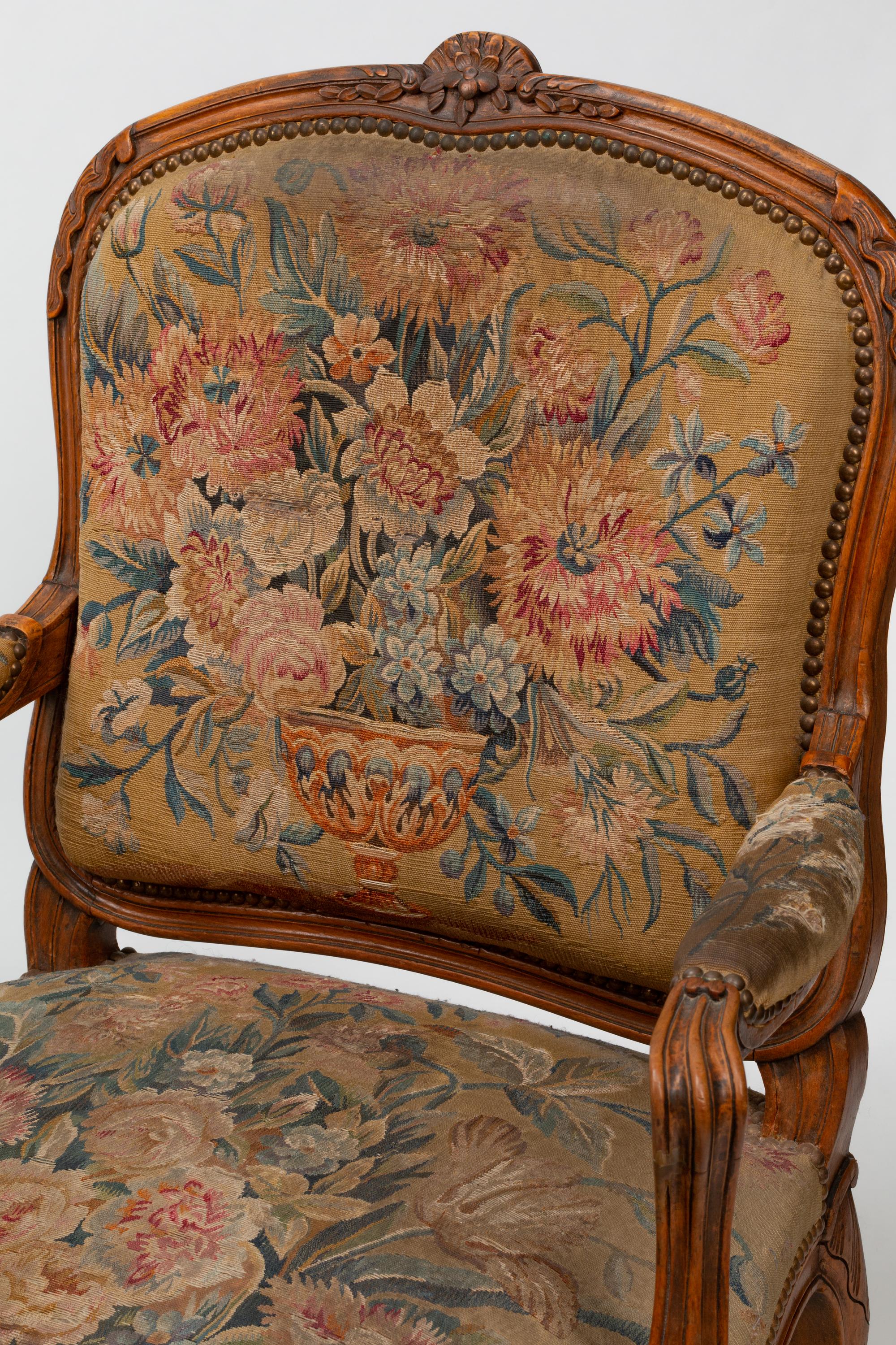 A Set of Four Louis XV Beechwood Fauteuils with Tapestry Upholstery