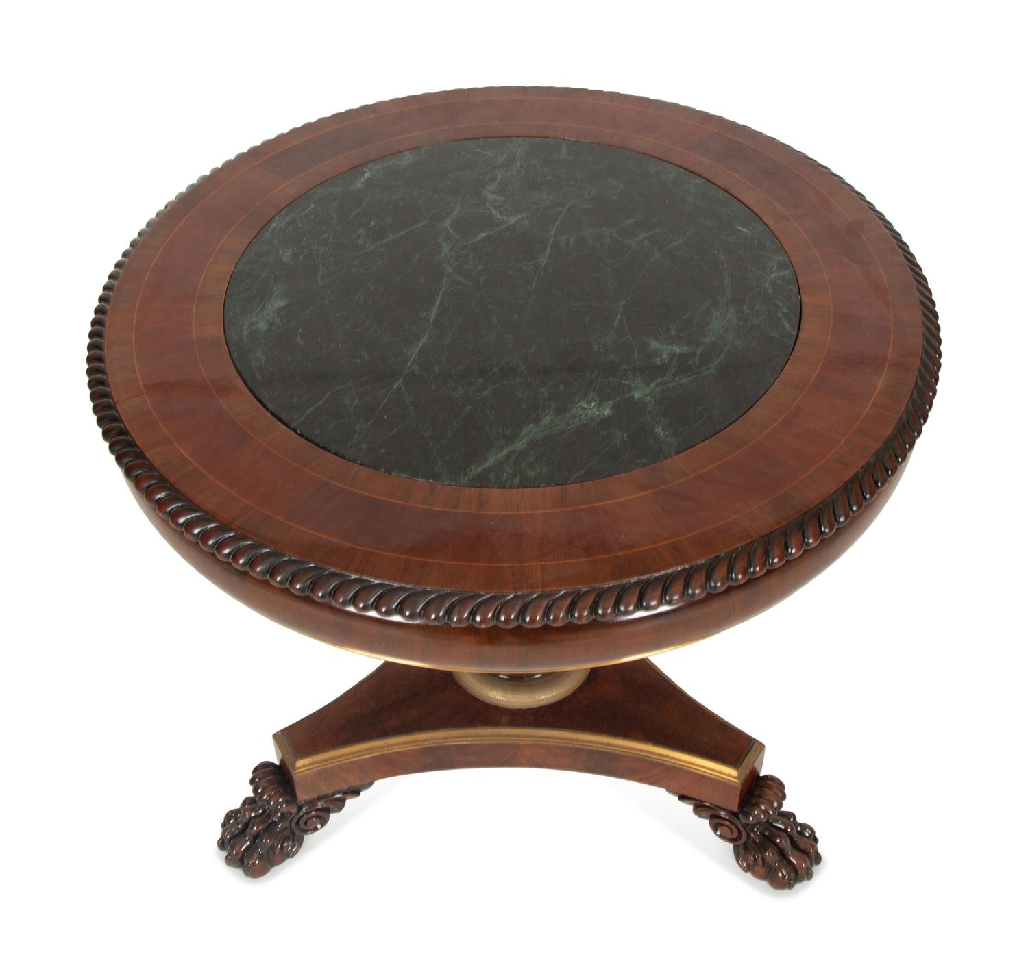 A Regency Style Mahogany and Rosewood Crossbanded Center Table with Inset Marble Top