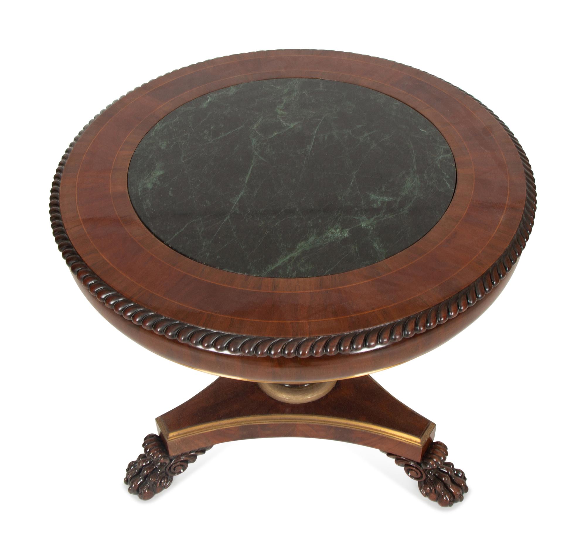 A Regency Style Mahogany and Rosewood Crossbanded Center Table with Inset Marble Top