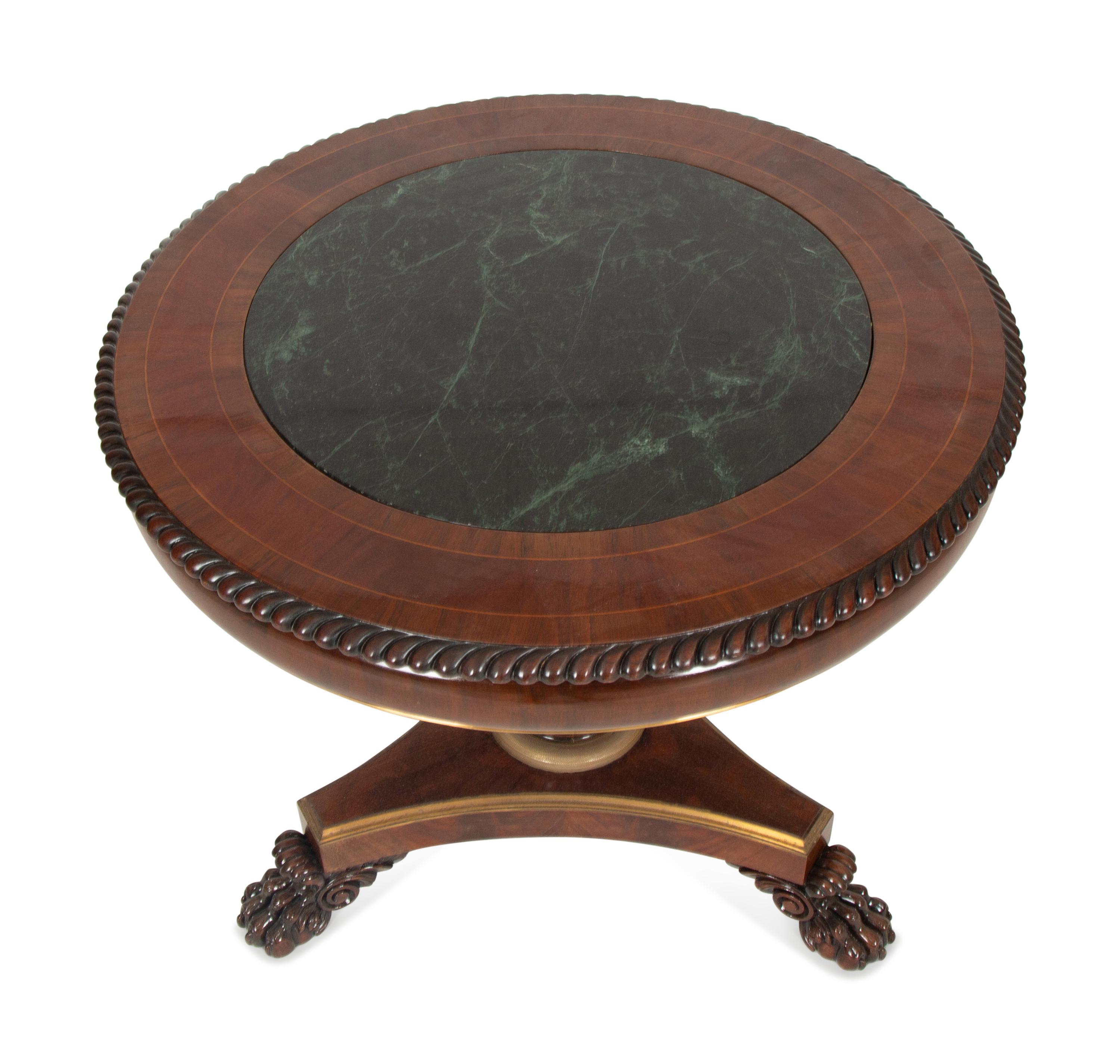 A Regency Style Mahogany and Rosewood Crossbanded Center Table with Inset Marble Top