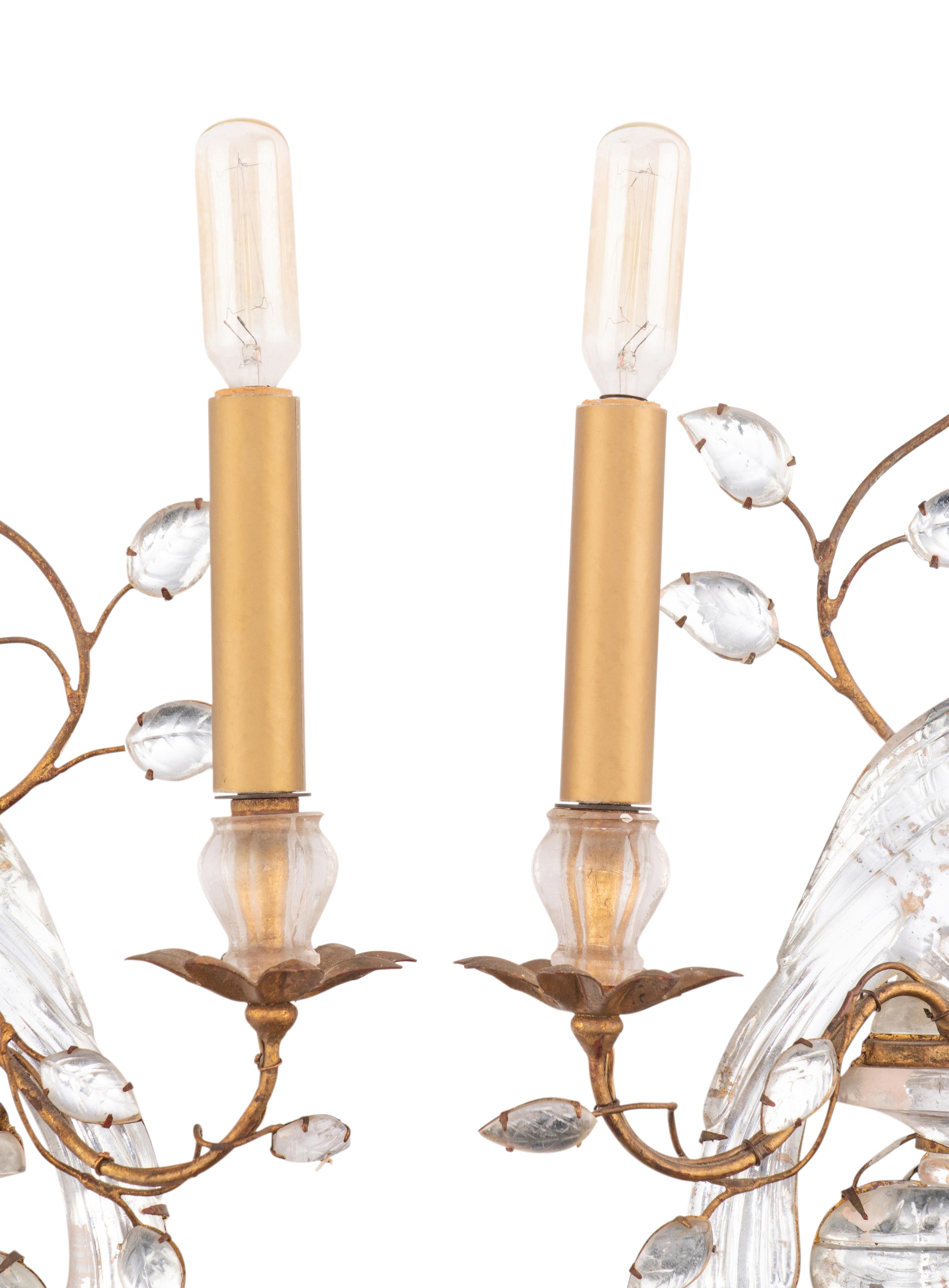 A Pair of Gilt Metal and Rock Crystal Two-Light Sconces