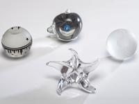 Four Glass Paperweights