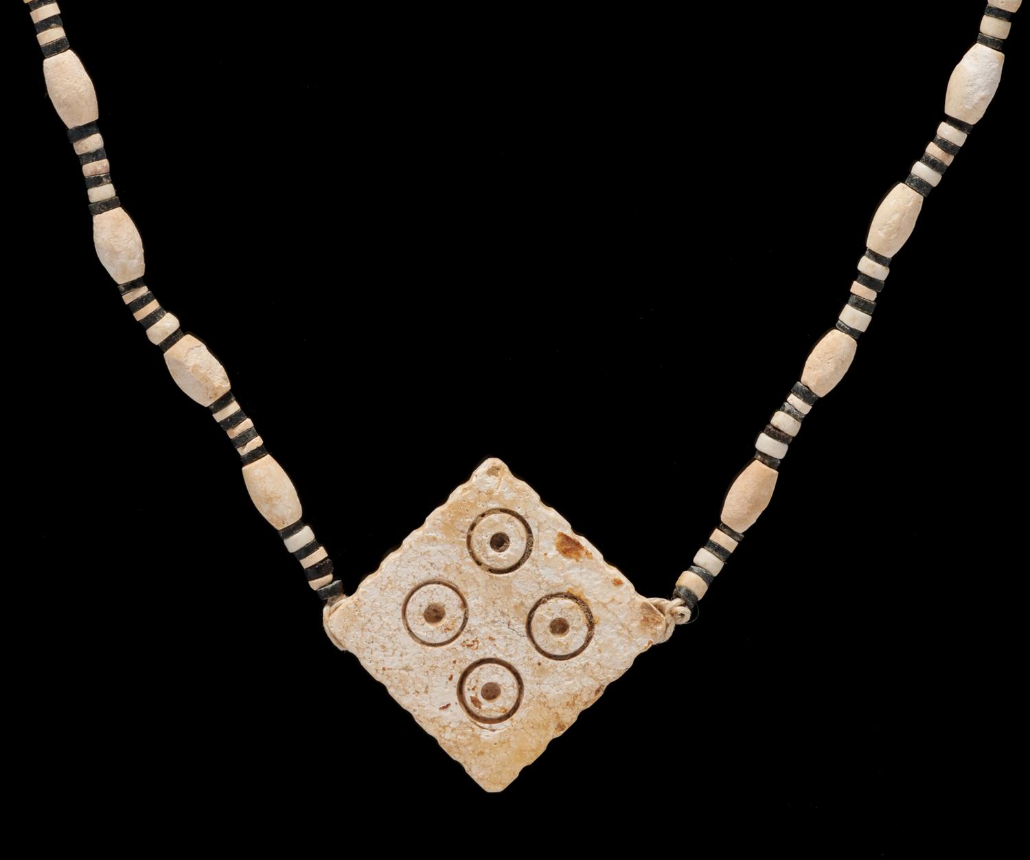 A Western Asiatic Stone and Shell Bead Necklace
