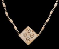 A Western Asiatic Stone and Shell Bead Necklace