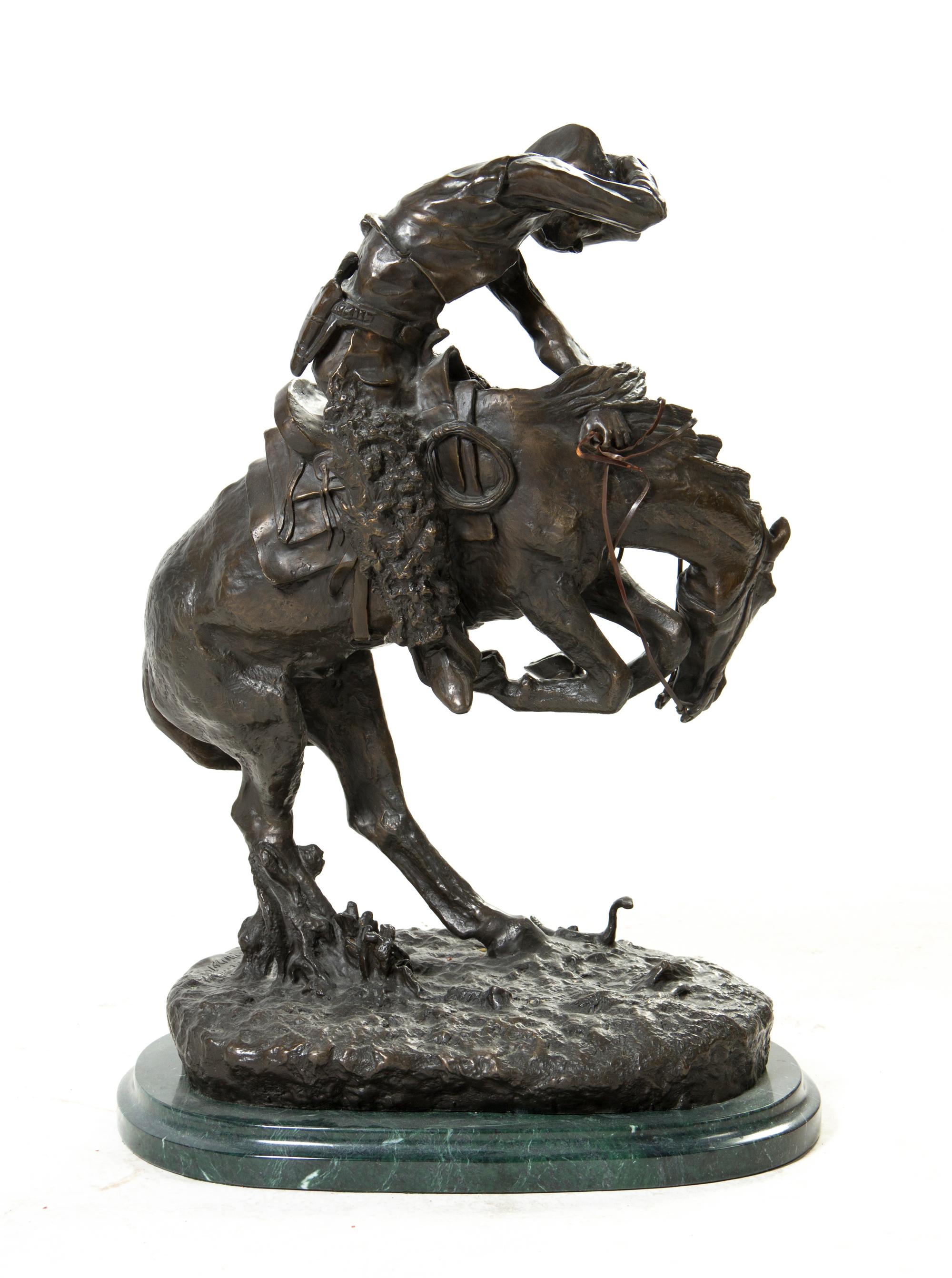 An American Bronze Figural Group, after Frederic Remington (1861-1909), Height 22 1/4 inches.