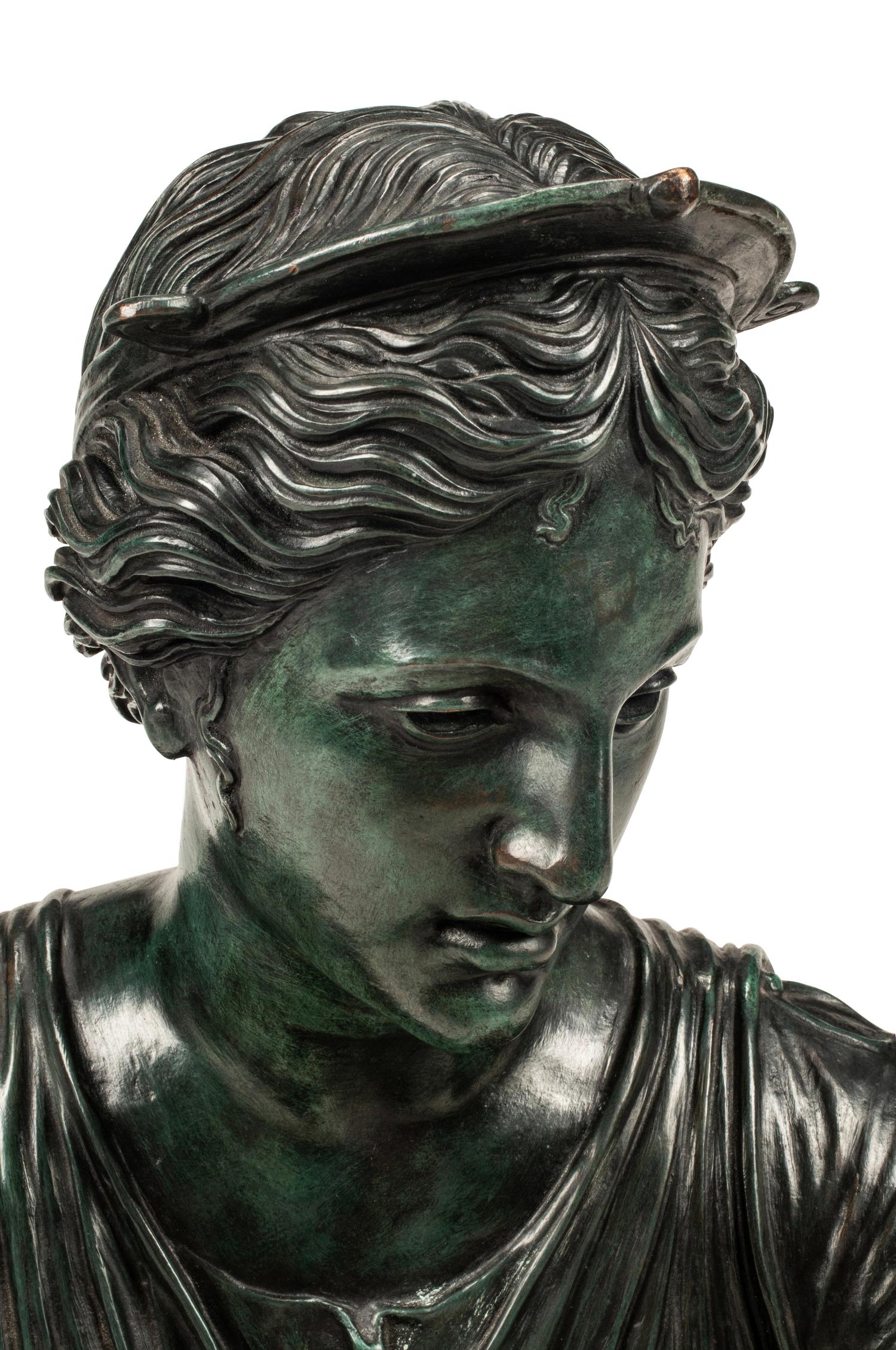 A Patinated Bronze Bust of a Woman