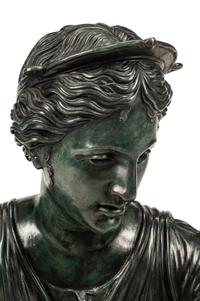 A Patinated Bronze Bust of a Woman
